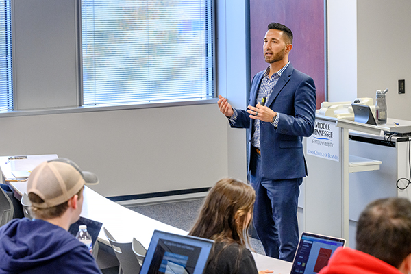 M.Acc. Professor teaching in classroom